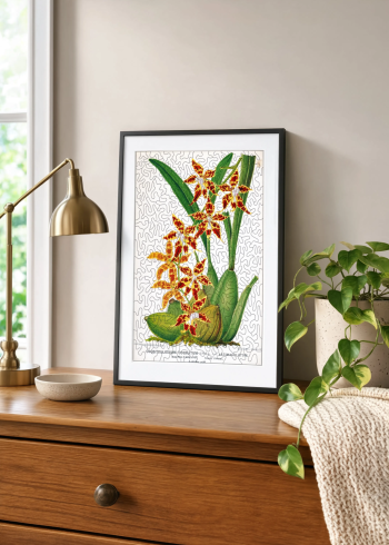 Puzzle en bois d'une planche d'orchidées encadré et posé sur un meuble en bois aux côtés d'une lampe dorée et d'une plante verte.