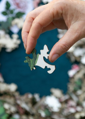 Pièce de puzzle en bois découpée au laser